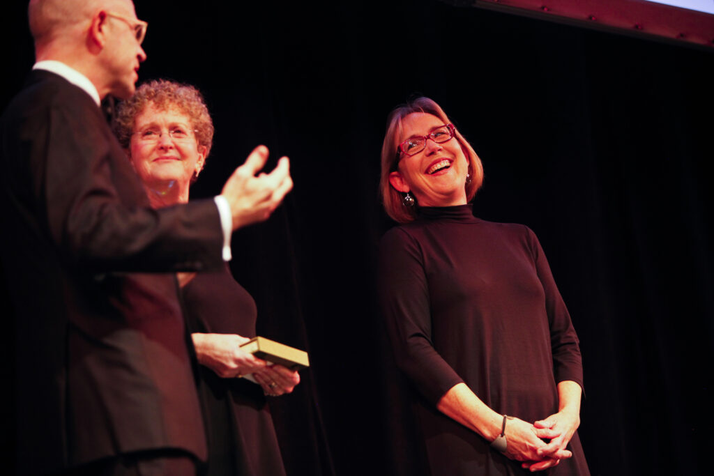 Sharon Moore laughing at Raleigh Medal of the Arts ceremony. Photo by Pigeon Gallery.